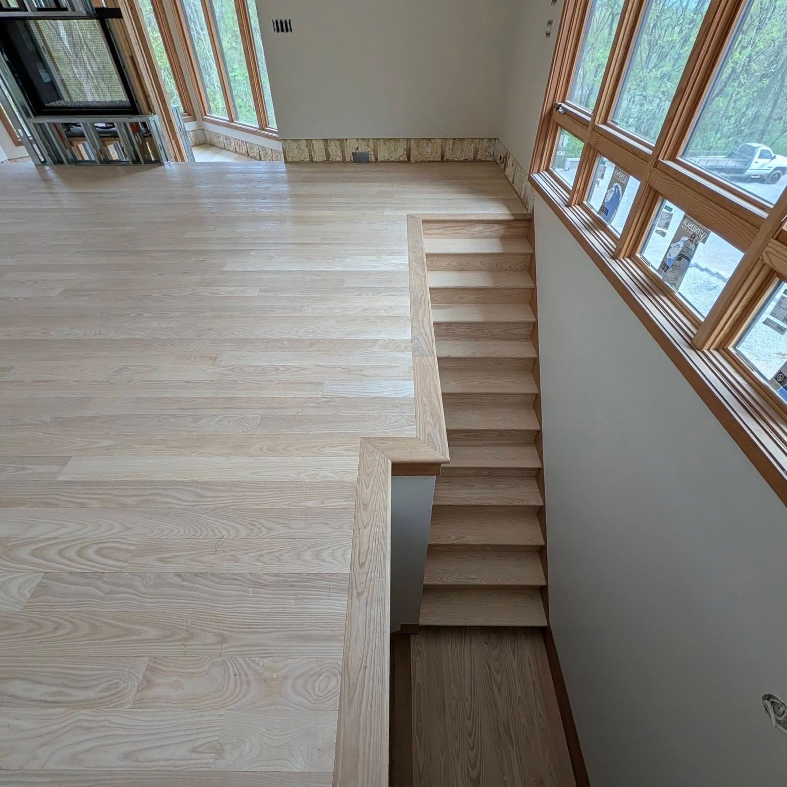 Top-down view of a straight wooden stair run