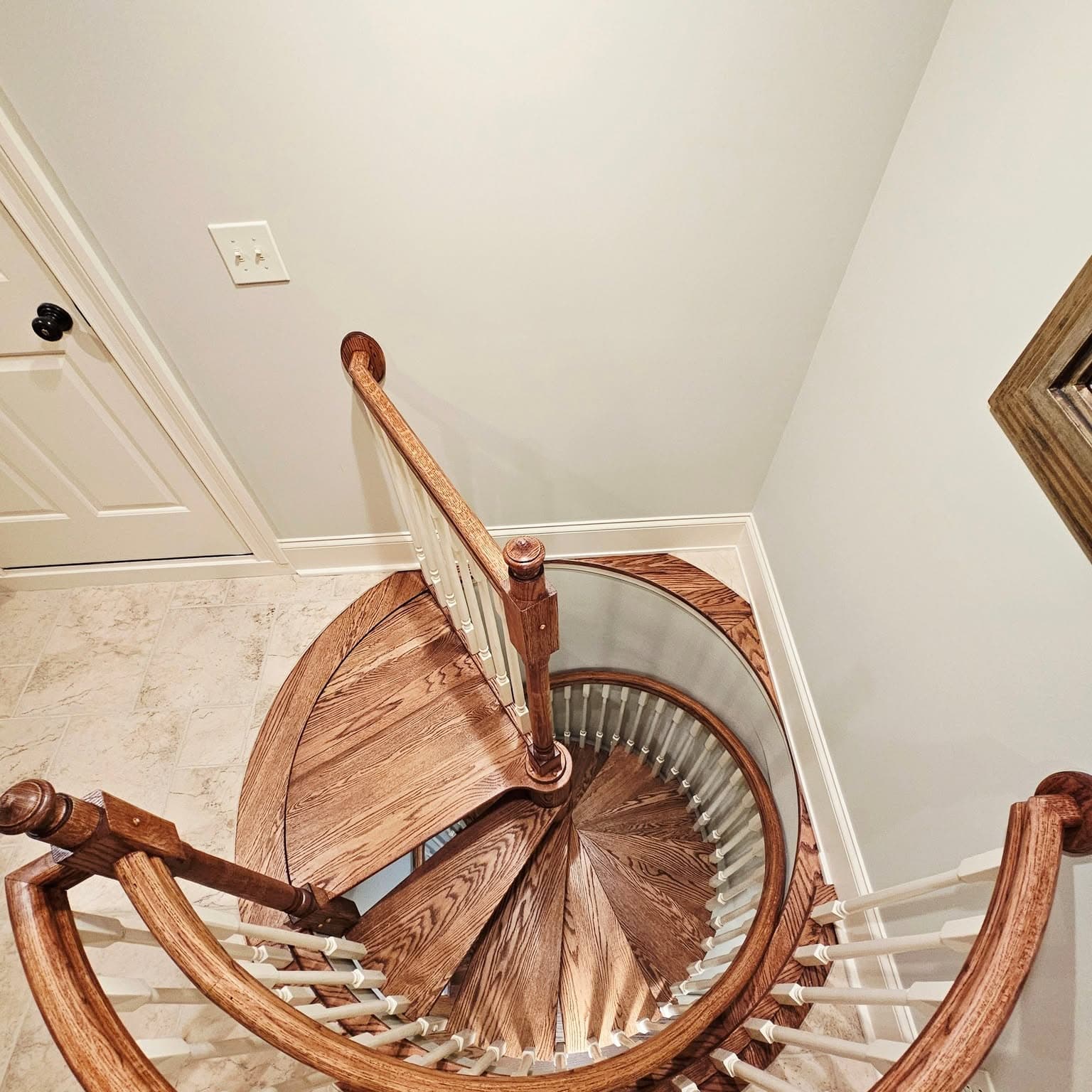 Top-down view into the center of the wooden spiral stair