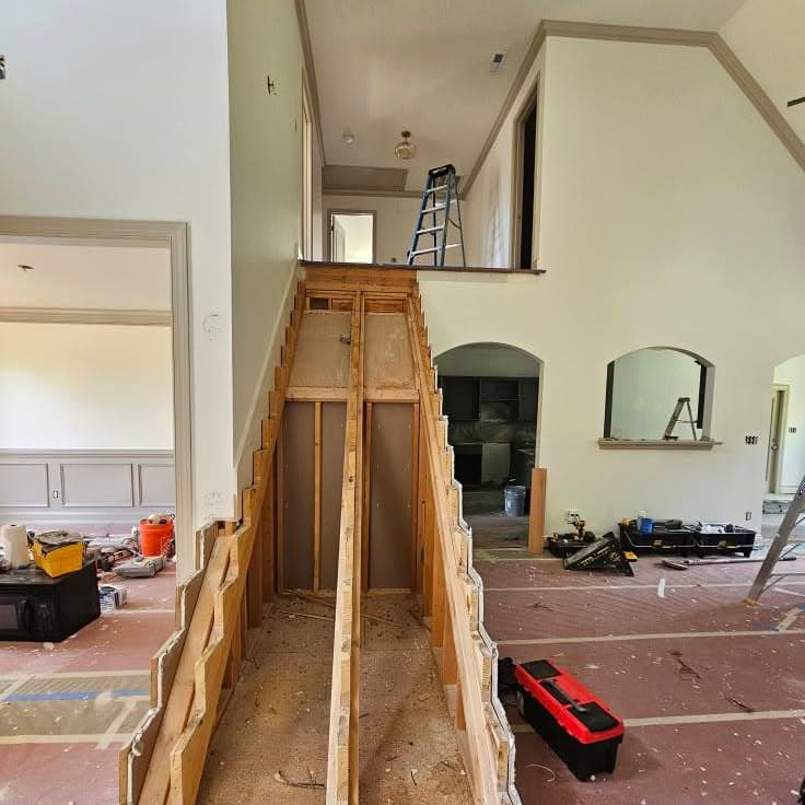 Skeletal wooden stair frame from a low side angle