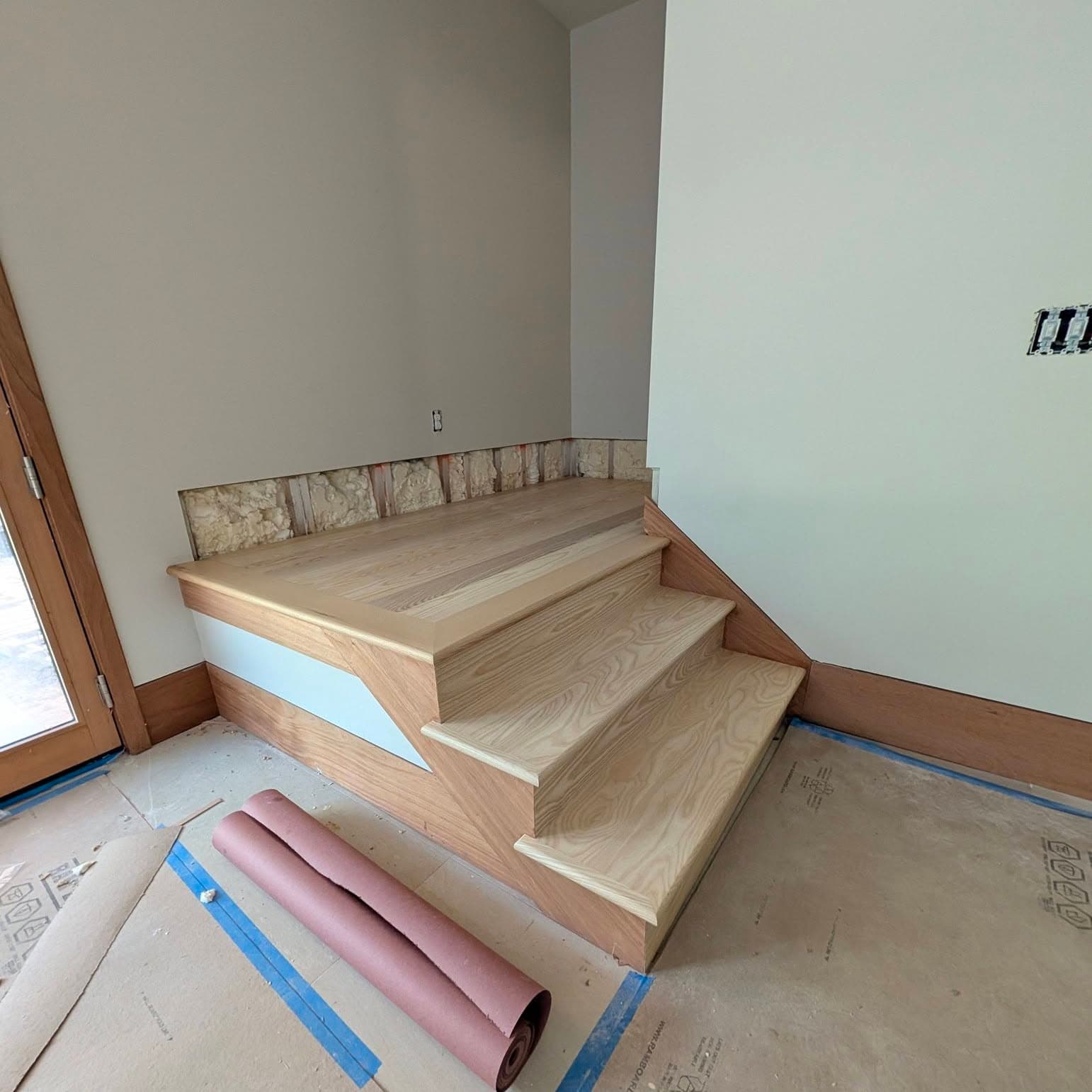 Hardwood stair and newel at the base of a Toney, AL run, Rocket City Stairs