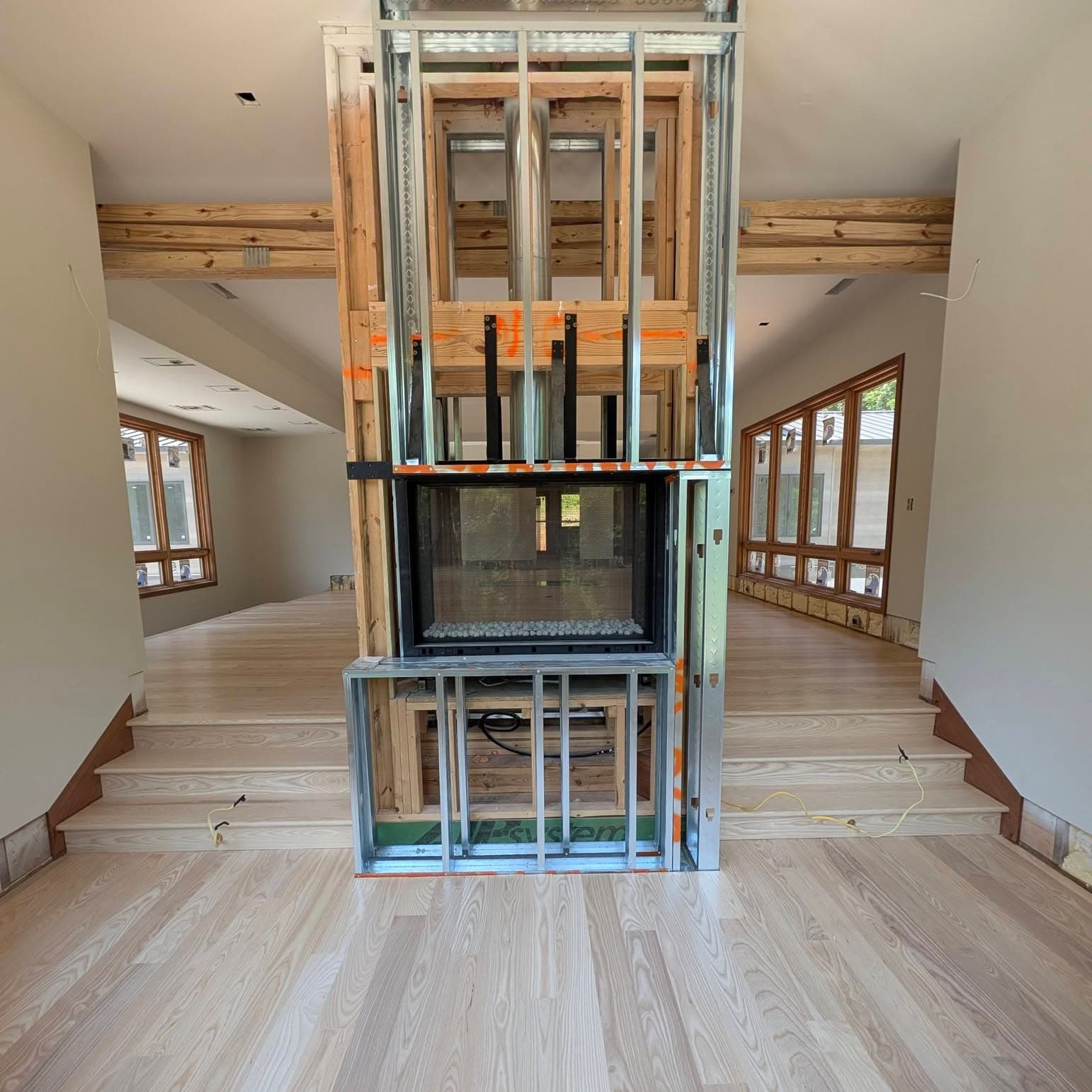 Hardwood treads and a wood handrail in a Meridianville, AL home, Rocket City Stairs