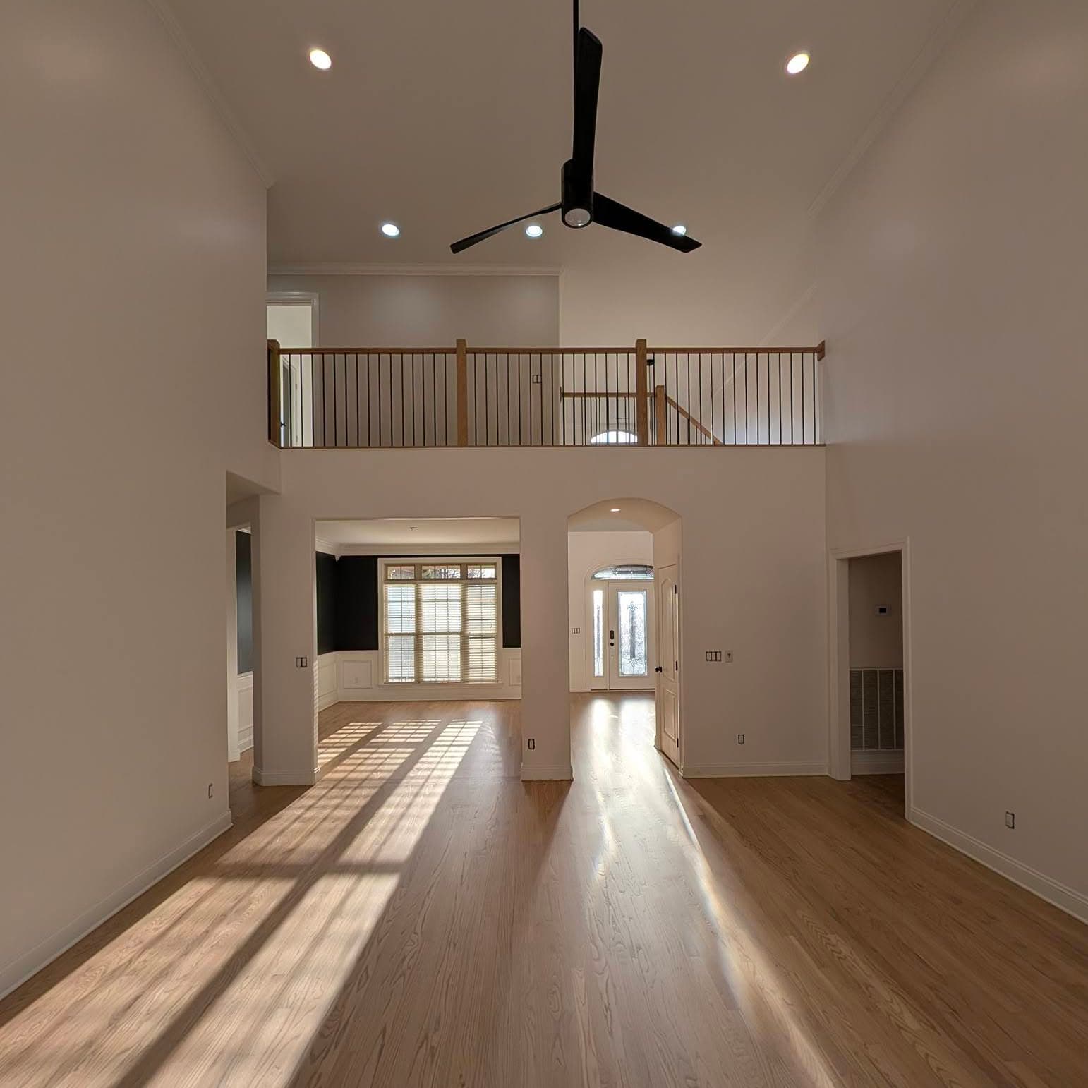 Wood-and-metal interior railing on a Meridianville, AL stair, Rocket City Stairs